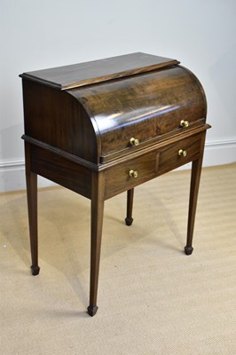 Lot 93 - An Edwardian mahogany roll top desk with two...