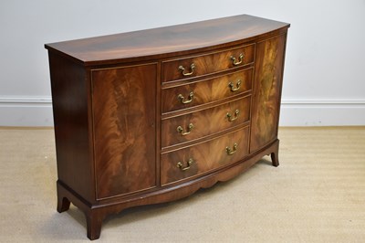 Lot 248 - A reproduction mahogany bowfront sideboard...