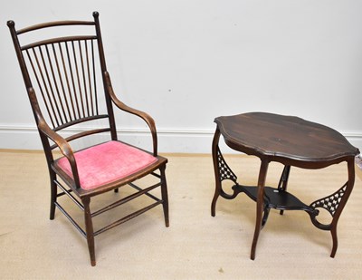 Lot 138 - An early 20th century stick back elbow chair...