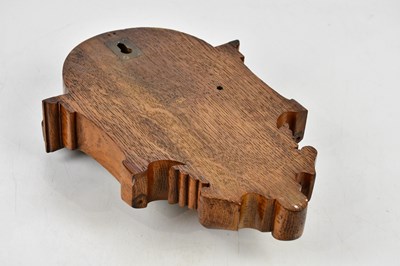 Lot 419 - A late Victorian carved oak barometer, the...
