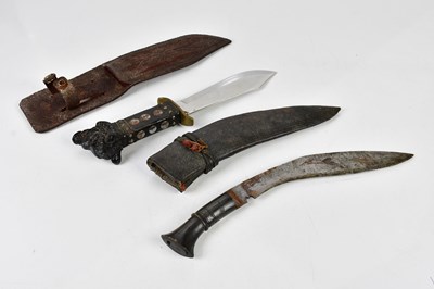 Lot 2560 - A kukri knife and scabbard, together with a...
