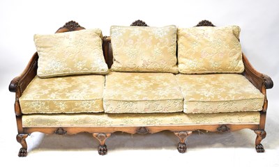 Lot 67A - A bergère caned three-seater sofa and two...