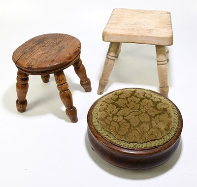 Lot 1571 - A small elm stool on turned column supports,...