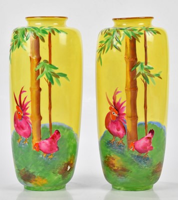 Lot 1513 - CROWN DUCAL; a pair of relief decorated vases,...