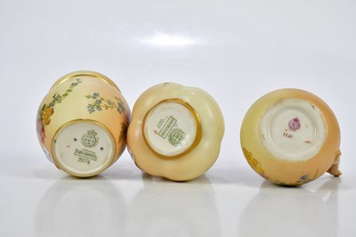 Lot 1345 - ROYAL WORCESTER; three pieces of blush ivory...