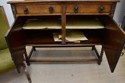 Lot 49 - An early 20th century oak sideboard, with two...