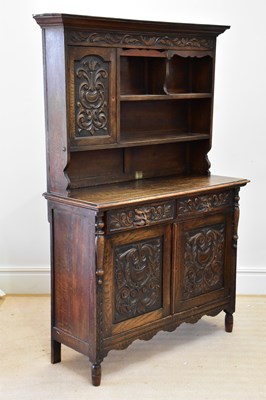 Lot 175 - An early 20th century Flemish style dresser...