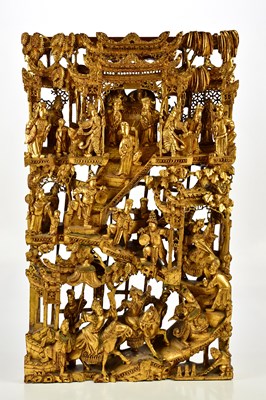 Lot 1248 - A Chinese carved gilt wood panel depicting...