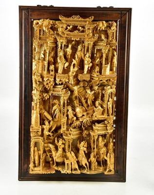 Lot 1227 - A Chinese gilt wood panel depicting figures in...