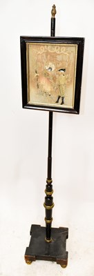 Lot 1573 - A Victorian ebonised and gilt decorated pole...