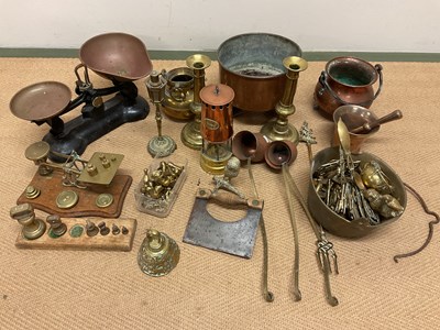 Lot 121 - A group of assorted copper and brass to...