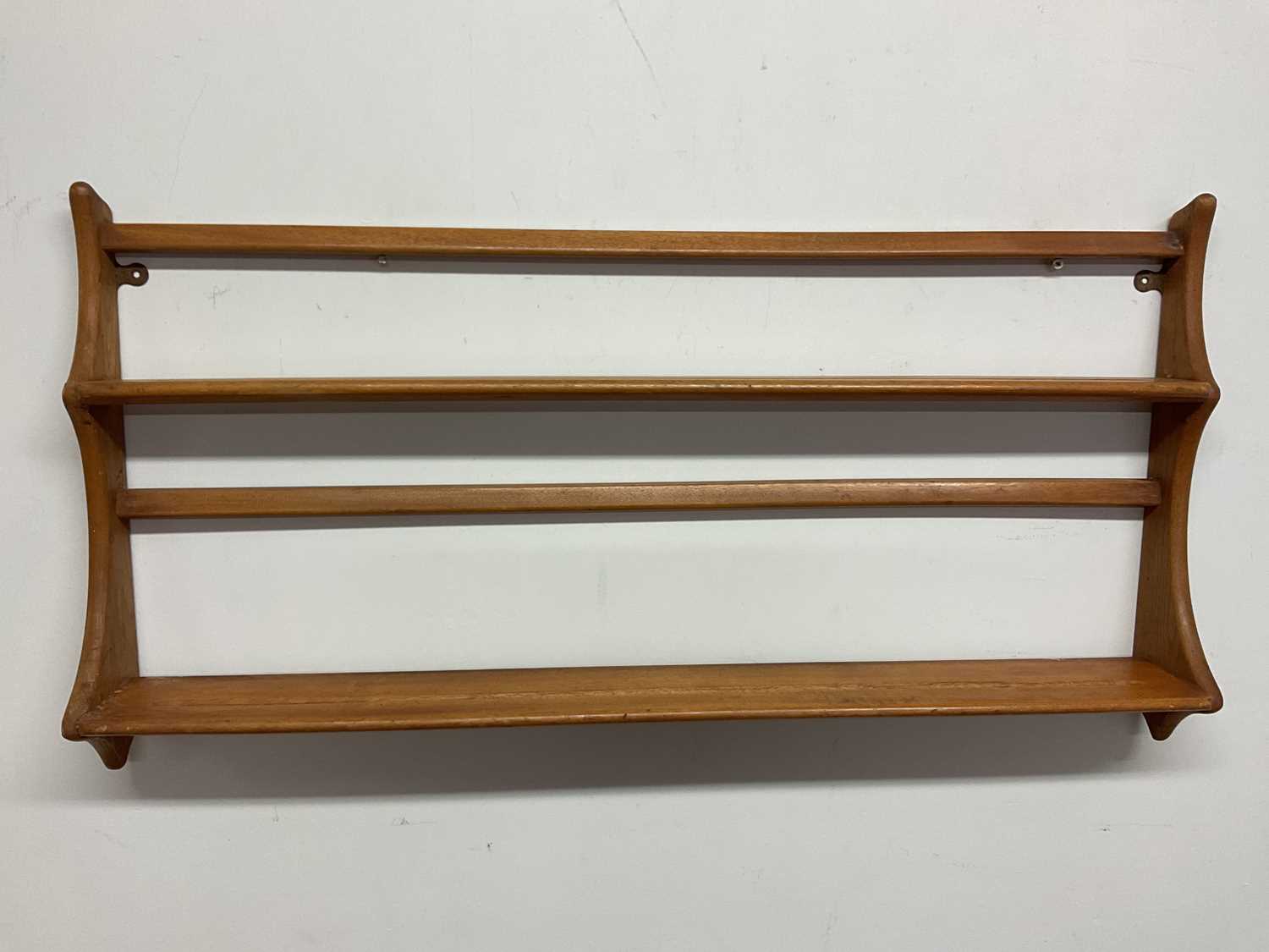Lot 689 - ERCOL; a beechwood plate rack, 50 x 96 x