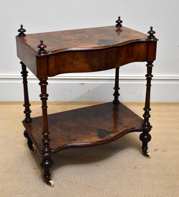 Lot 152 - A Victorian walnut two tier serpentine front...