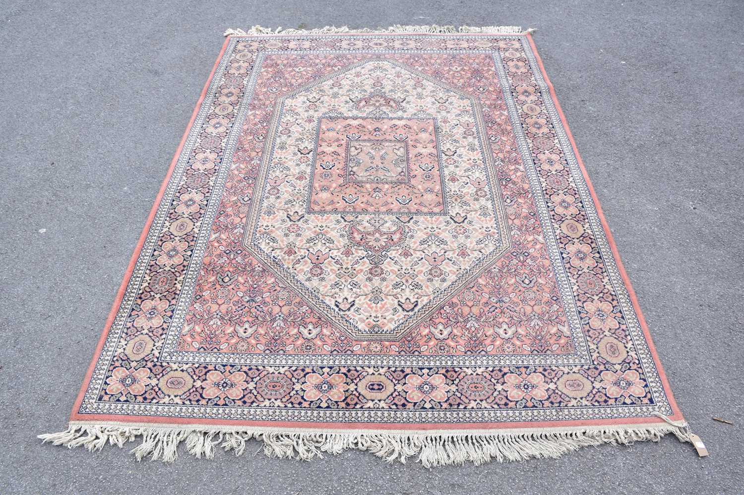 Lot 440 - A Super Keshan rug with floral decoration on a...