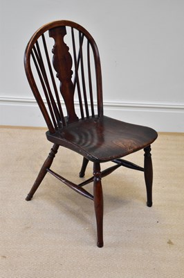 Lot 179 - A 19th century elm seated Windsor type chair,...