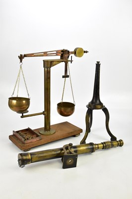 Lot 710 - A vintage brass scales, on oak plinth, the...