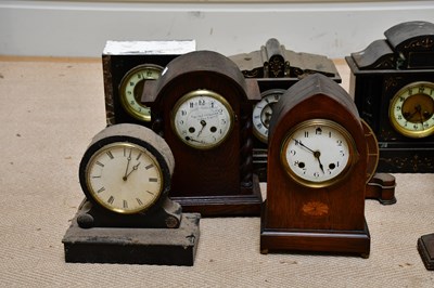 Lot 375 - An Edwardian inlaid oak lancet shaped mantel...