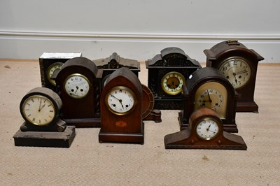 Lot 375 - An Edwardian inlaid oak lancet shaped mantel...