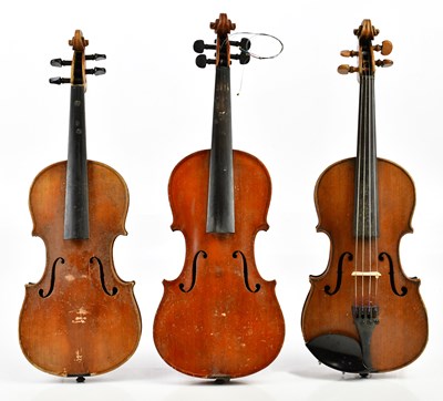 Lot 1043 - Three German half size violins comprising a...