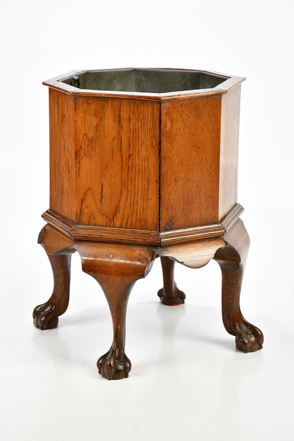 Lot 24 - A late 19th century octagonal oak cellarette