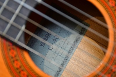Lot 1075 - A Yamaha C-40 acoustic guitar and a Terada...