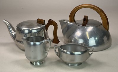 Lot 122 - A Picquot ware four piece tea service.