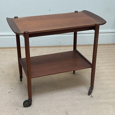 Lot 224 - A mid 20th century teak two tier trolley, with...