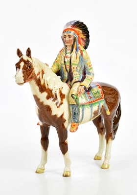 Lot 1539 - BESWICK; a native American upon a horse,...