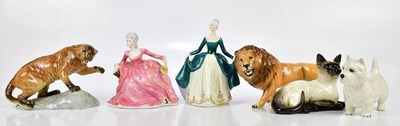 Lot 1540 - BESWICK; a collection of four figures...