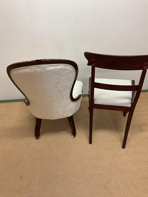 Lot 710 - Two chairs, one on castors, both upolstered,...