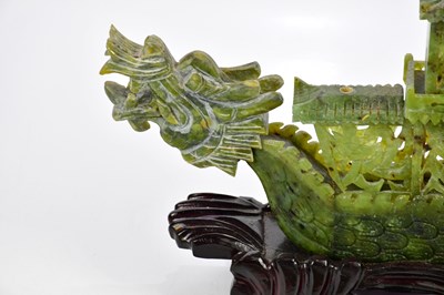 Lot 1205 - A Chinese hardstone model of a junk, the mast...