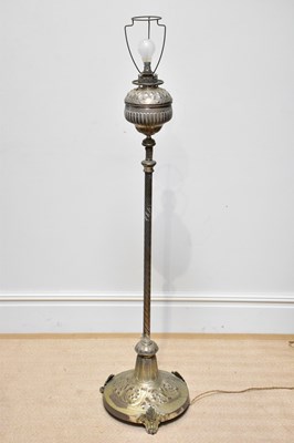 Lot 827 - A brass standard lamp, converted from oil to...