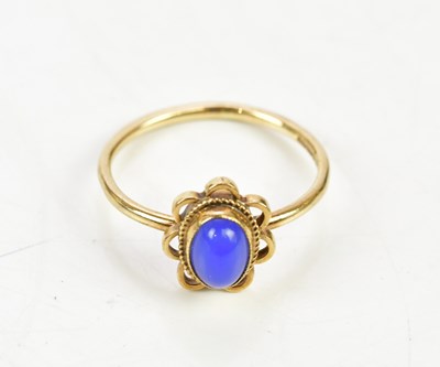 Lot 194 - A 9ct gold ring set with blue oval cabochon,...