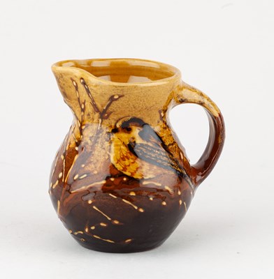 Lot 80 - CAROLE GLOVER; a slip decorated earthenware...