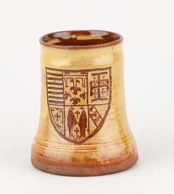 Lot 65 - Leach Pottery; a slipware mug decorated with a...