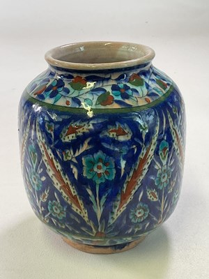 Lot 281 - A Palestinian vase with floral and leaf...