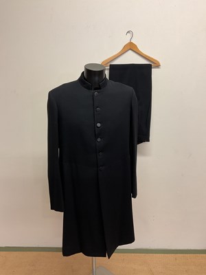 Lot 104 - A vintage frock coat and trousers by Browne...