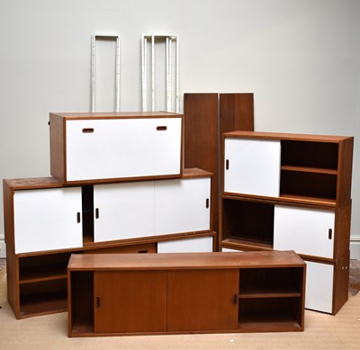 Lot 222 - A mid century teak Ladderax type system,...