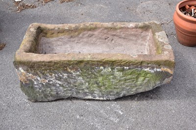 Lot 460 - A sandstone trough, height 33cm, width 90cm,...