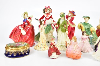 Lot 1519 - ROYAL DOULTON; a collection of figures...