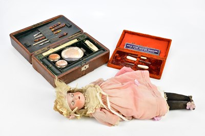 Lot 679 - A Victorian leather travelling vanity set, the...