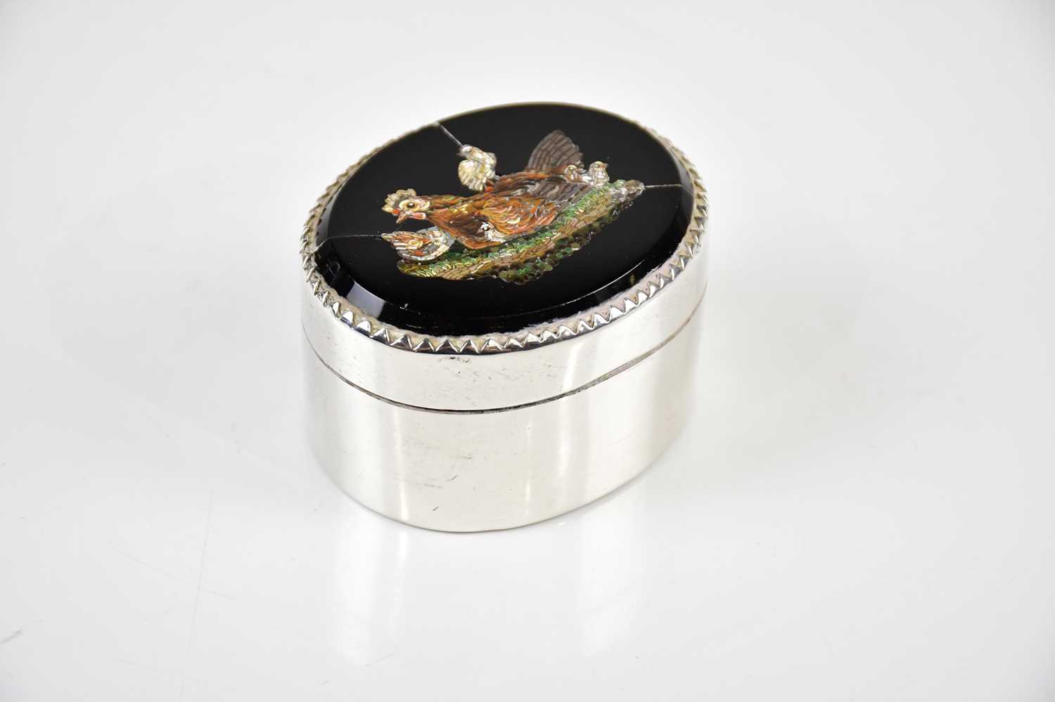 Lot 2218 - A Continental white metal pill box, the lid...