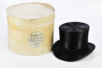 Lot 814 - MOSS BROS; a gentleman's top hat, 7F, fitted...