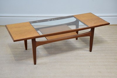 Lot 220 - G-PLAN; a teak coffee table with glass inset...