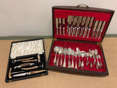 Lot 131 - A canteen of cutlery and a bar set with deer...