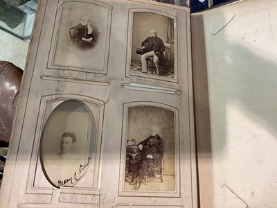 Lot 31 - A Victorian photograph album, containing...