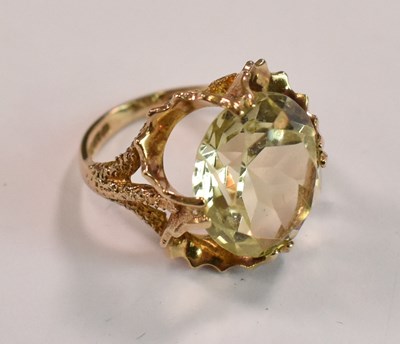 Lot 483 - A 9ct yellow gold and citrine dress ring with...