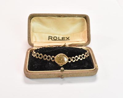 Lot 514 - A lady's vintage 9ct yellow gold wristwatch...