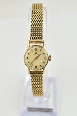 Lot 1201 - OMEGA; a ladies' 9ct gold crown wind...