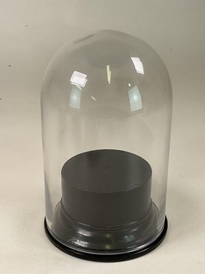 Lot 44 - A glass dome on wooden stand, height 26cm, a...